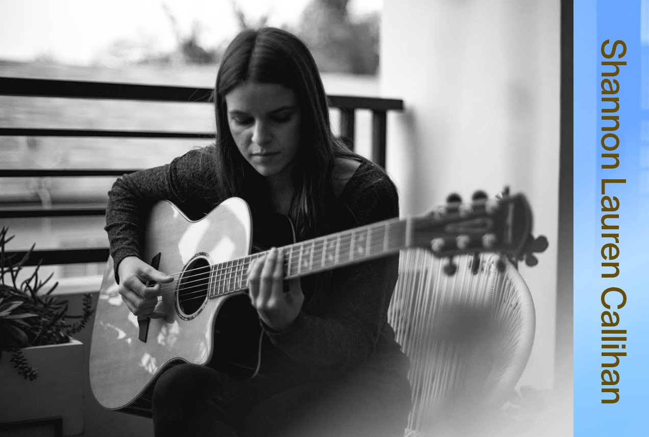 Shannon Lauren Callihan playing an orangewood guitar