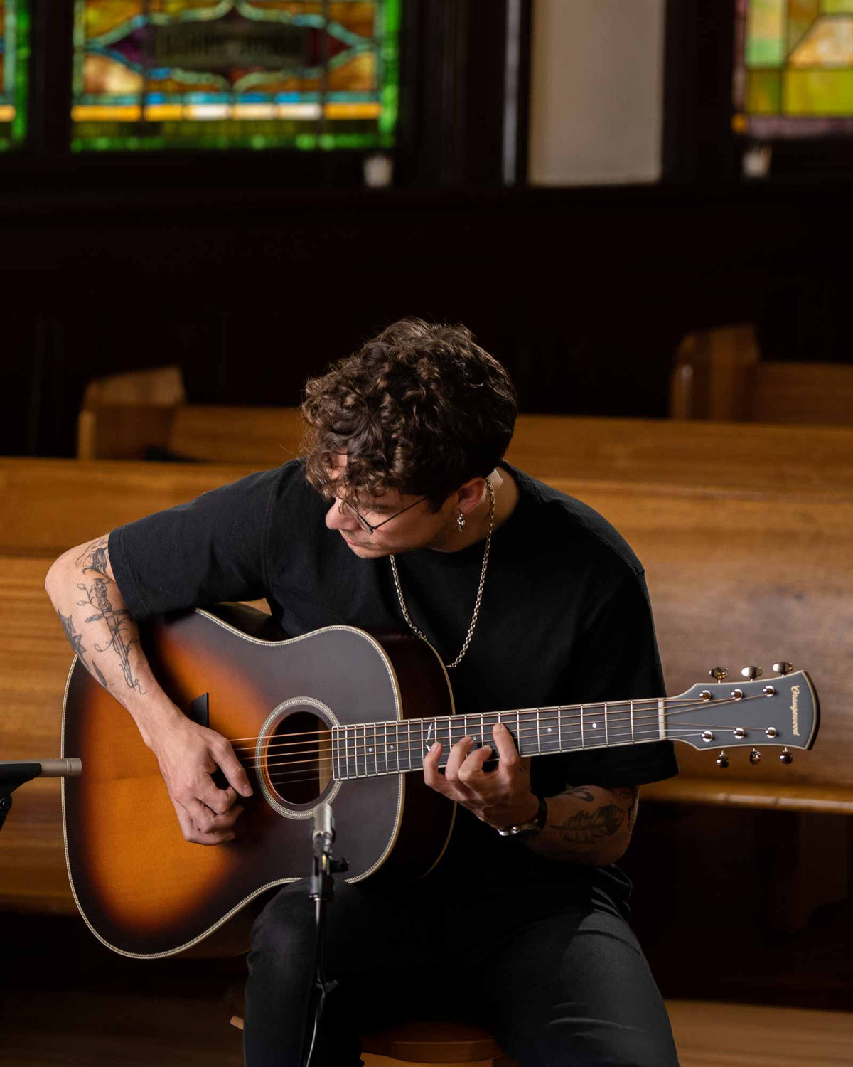 Artist playing the dolores in a church