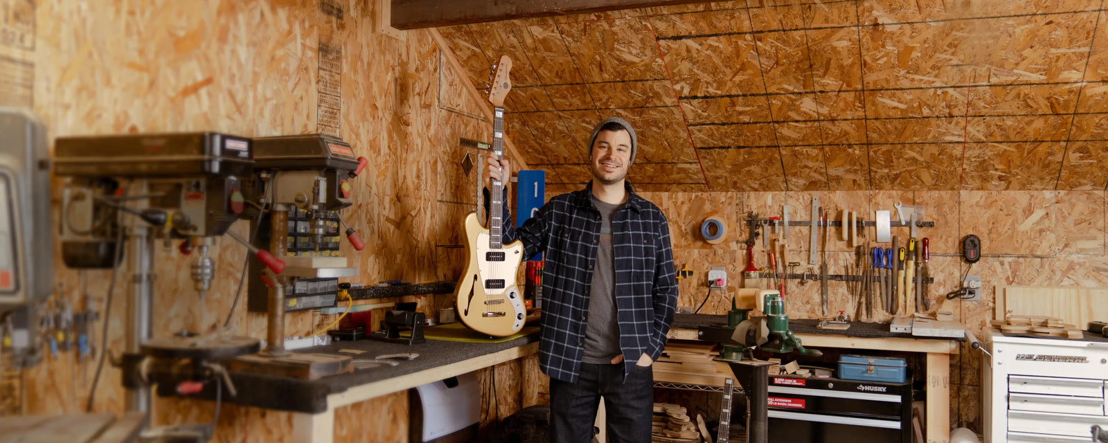 Luthier with the Del Sol Baritone in a workshop