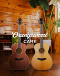 Orangewood Care: mahogany and spruce acoustic guitars in a wood-paneled room