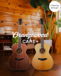 Orangewood Care+ with yearly setups: mahogany and spruce acoustic guitars in a wood-paneled room