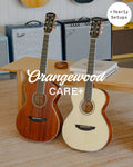 Orangewood Care+ with yearly setups: mahogany and white acoustic guitars in a room with amplifiers